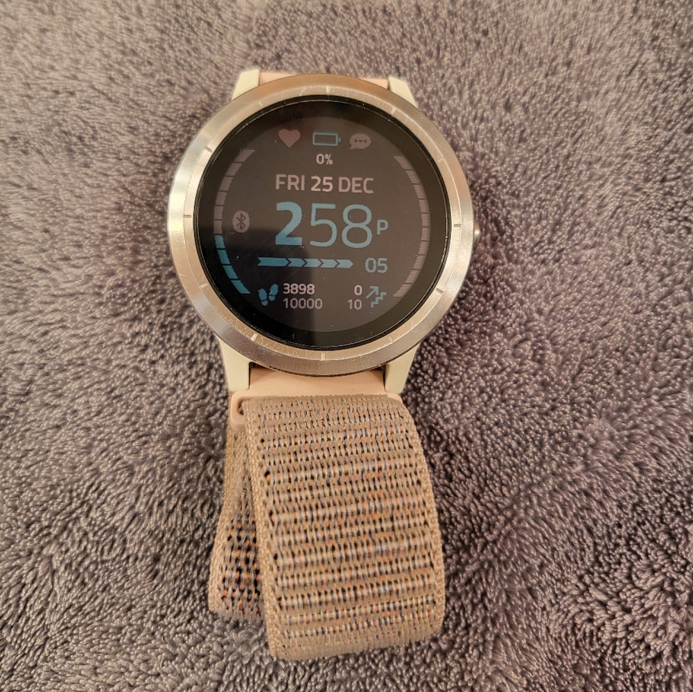 COPY - Silver Garmin Vivoactive 3 with multiple colored rubber covers and watch…